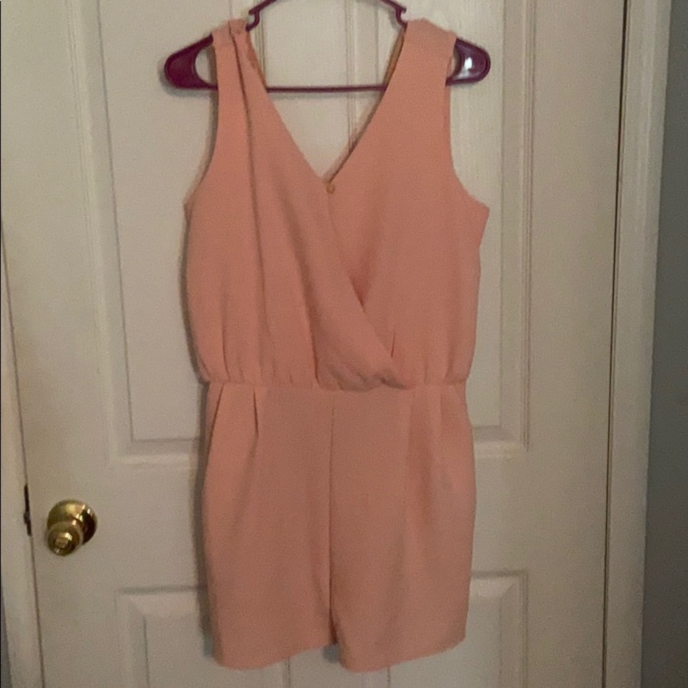 Never worn peach romper